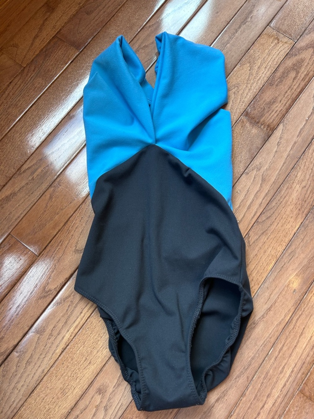 Five YXL blue/black leotard